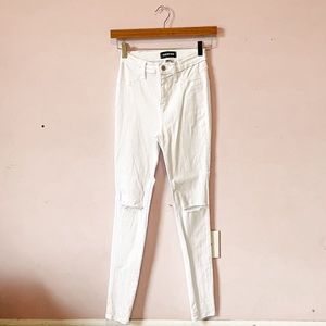 • fashion nova white distressed jeans •